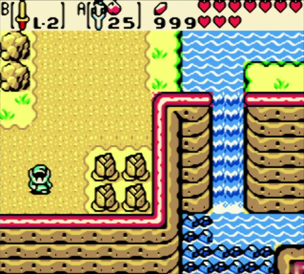 Link on the sand above the waterfall cliff, beside boulders Link on the sand above the waterfall cliff, beside boulders
