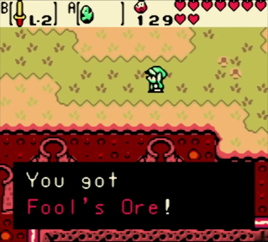 Link holding the Fool's Ore left in place of the Feather Link holding the Fool's Ore left in place of the Feather
