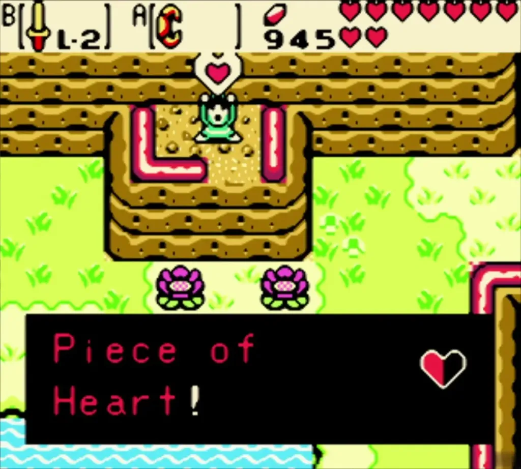 Link holding up a Piece of Heart on the ledge below the cliff Link holding up a Piece of Heart on the ledge below the cliff