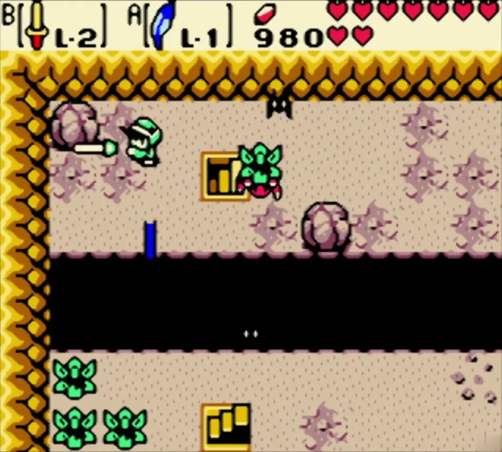 Link fighting a spider beside the bat-filled pit in the cave Link fighting a spider beside the bat-filled pit in the cave