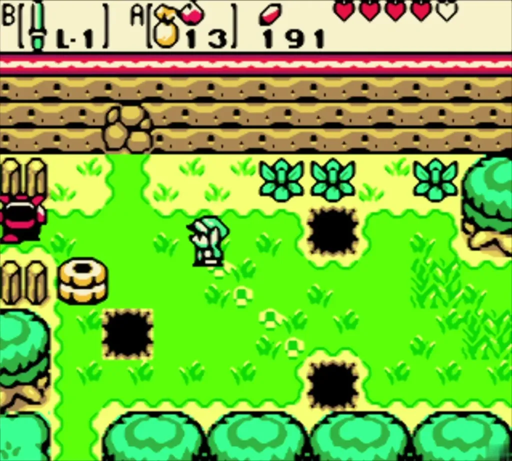 Link on the grassy screen with pits and an Octorok near the north cliff Link on the grassy screen with pits and an Octorok near the north cliff