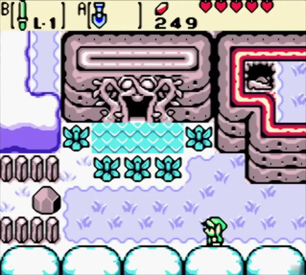 Link approaching the snowy head-shaped rock and the entrance of Snake's Remains Link approaching the snowy head-shaped rock and the entrance of Snake's Remains