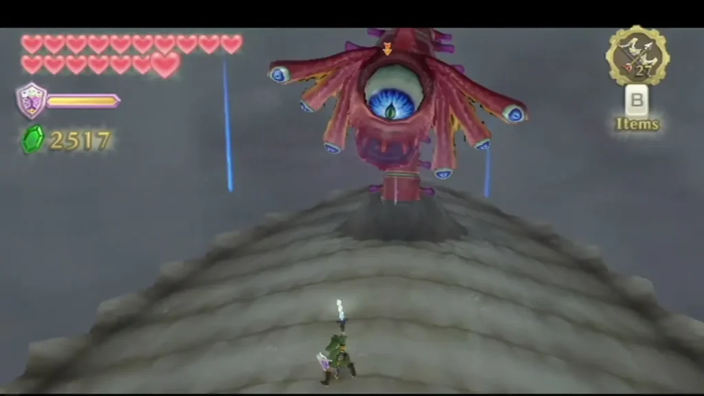 Bilocyte's large blue eye glares above the Thunderhead platform while Link waits below with his sword. Bilocyte's large blue eye glares above the Thunderhead platform while Link waits below with his sword.