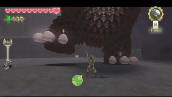 Link stands in the Sealed Grounds arena as The Imprisoned's huge scaled body looms over him. Link stands in the Sealed Grounds arena as The Imprisoned's huge scaled body looms over him.