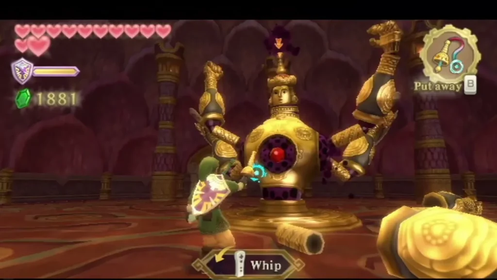Link whips one of Koloktos's six golden arms in the Ancient Cistern boss arena, with the Whip prompt shown Link whips one of Koloktos's six golden arms in the Ancient Cistern boss arena, with the Whip prompt shown