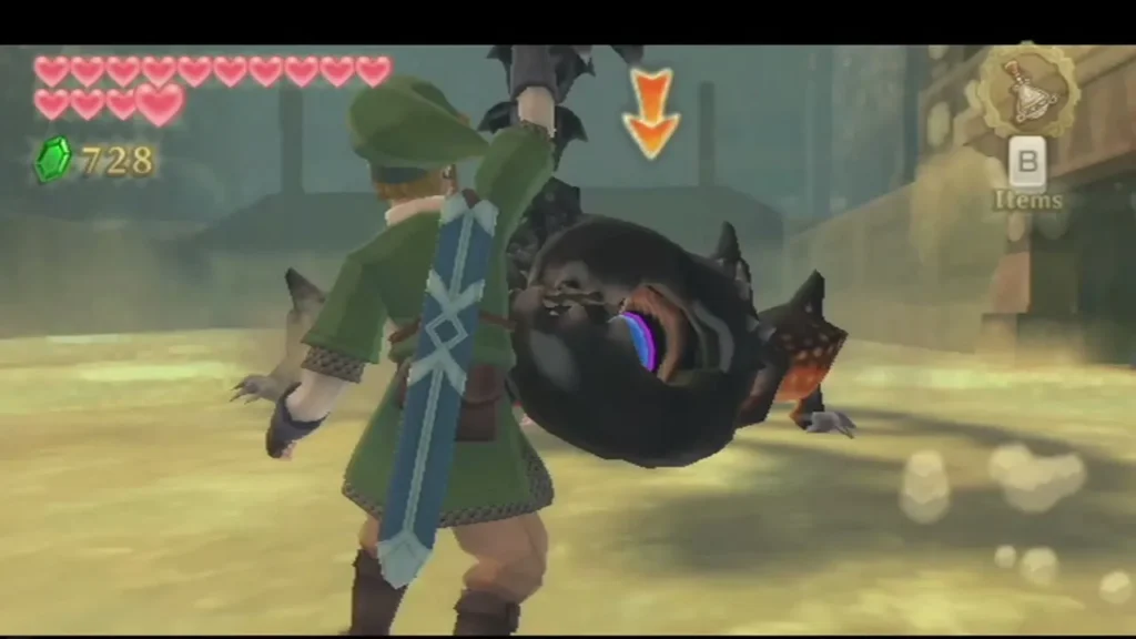Link swings his sword beside a black Moldarach claw, its purple eye showing in the sandy arena Link swings his sword beside a black Moldarach claw, its purple eye showing in the sandy arena