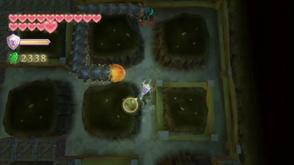 A spiked Moldorm with a glowing orange tail winds through the underground tunnel grid, with Link nearby A spiked Moldorm with a glowing orange tail winds through the underground tunnel grid, with Link nearby