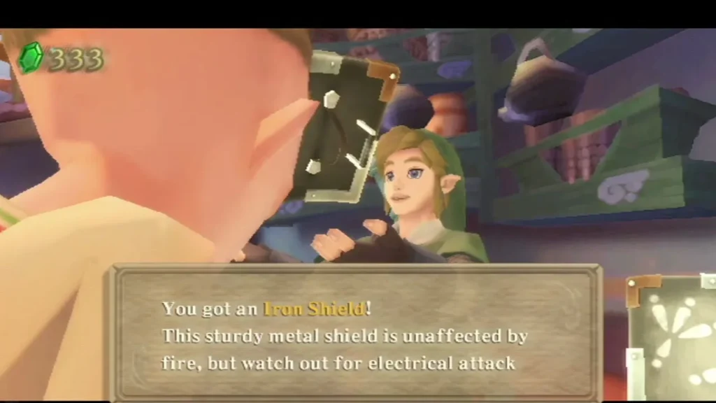 Link receives an Iron Shield at the Bazaar item shop; the box says it is unaffected by fire. Link receives an Iron Shield at the Bazaar item shop; the box says it is unaffected by fire.
