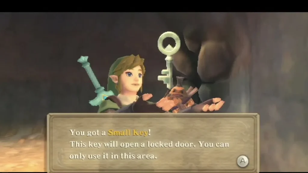 Link holds up a Small Key in a dim cave, with Golo the Goron standing at his side. Link holds up a Small Key in a dim cave, with Golo the Goron standing at his side.