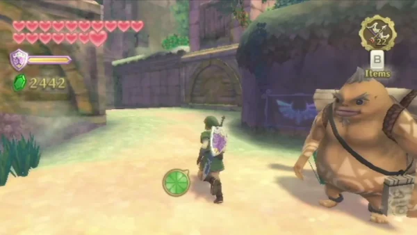 A round Goron carrying a scroll stands beside Link on a sunlit path between stone walls. A round Goron carrying a scroll stands beside Link on a sunlit path between stone walls.