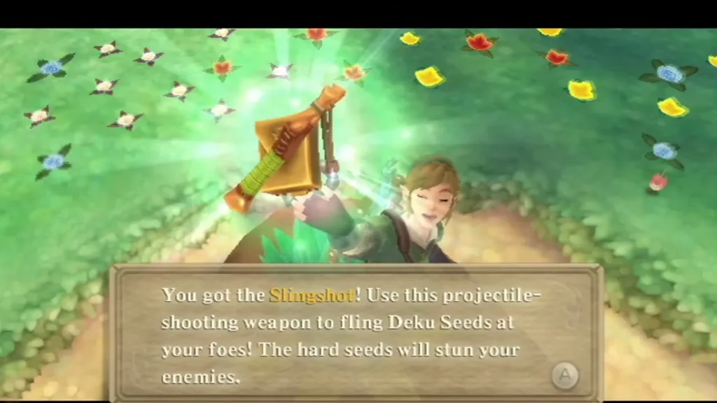 Link raises the Slingshot in a golden glow, and a box says it flings Deku Seeds at foes. Link raises the Slingshot in a golden glow, and a box says it flings Deku Seeds at foes.