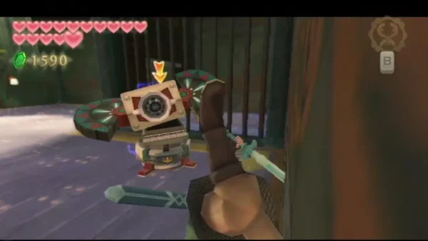 Link aims at a Beamos with a glowing eye behind iron bars in an alcove of the Sandship. Link aims at a Beamos with a glowing eye behind iron bars in an alcove of the Sandship.