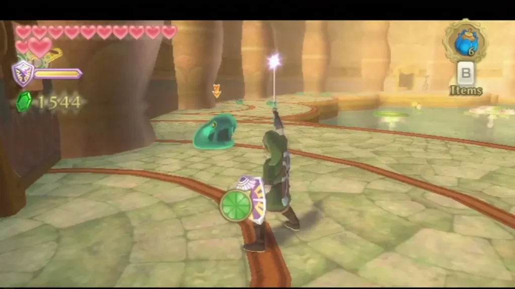 Link raises his sword at a smaller Blue Chuchu in the Ancient Cistern Link raises his sword at a smaller Blue Chuchu in the Ancient Cistern