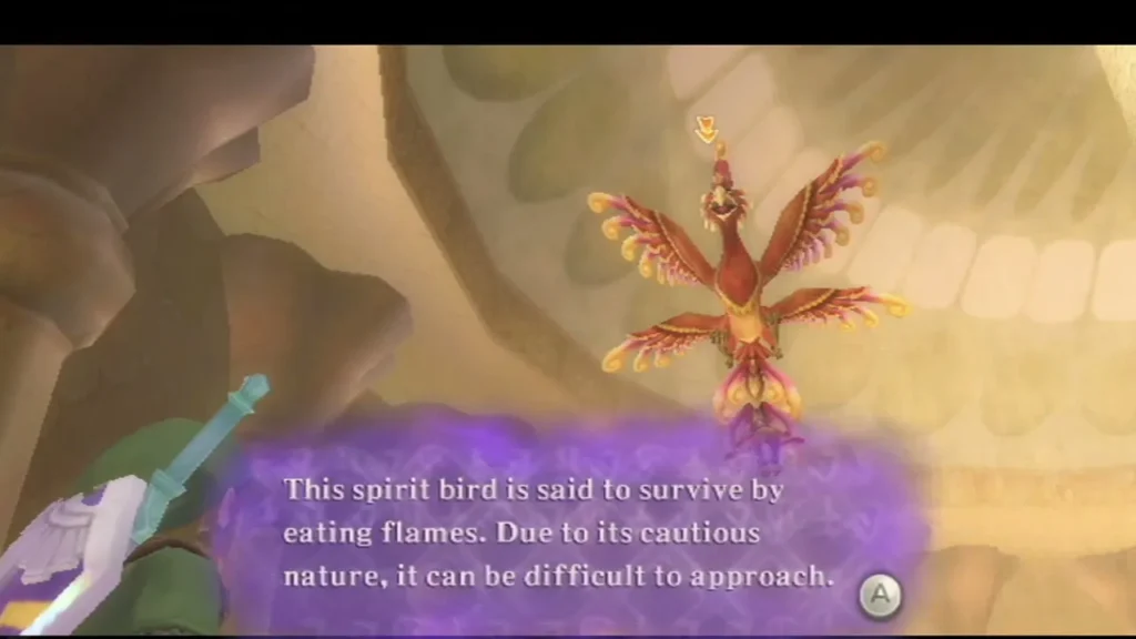 A red spirit bird hovers high in a golden chamber, and a box says it survives by eating flames. A red spirit bird hovers high in a golden chamber, and a box says it survives by eating flames.