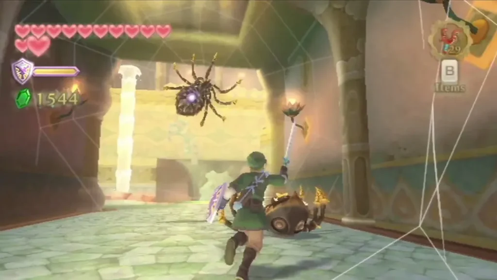 Link runs through a web-strung hall in the Ancient Cistern with a spider overhead and another crawling behind him Link runs through a web-strung hall in the Ancient Cistern with a spider overhead and another crawling behind him