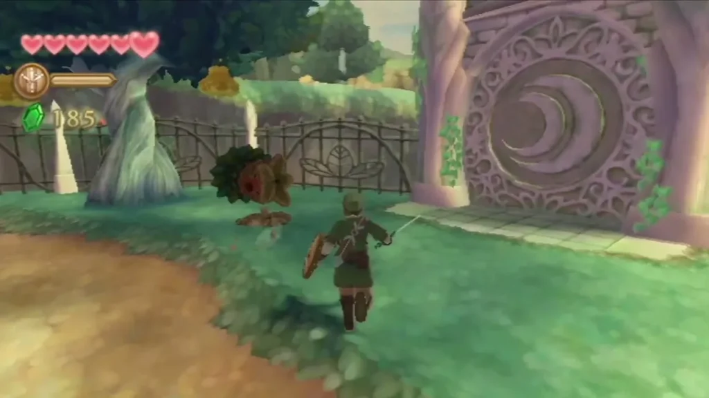 Link runs at a tuft-covered Octorok beside the stone gate in Faron Woods Link runs at a tuft-covered Octorok beside the stone gate in Faron Woods