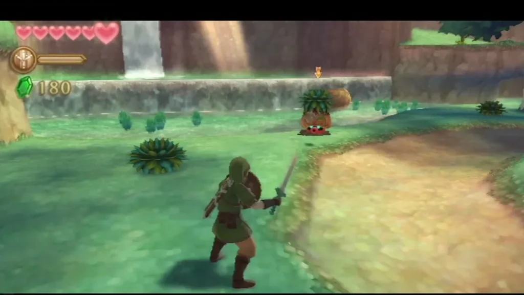 Link runs at a tuft-covered Octorok popping up from the ground beside the Faron Woods waterfall Link runs at a tuft-covered Octorok popping up from the ground beside the Faron Woods waterfall