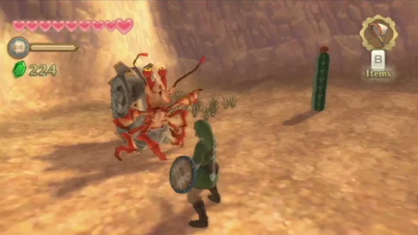 Link stands with his shield beside a red desert Octorok with a grey rock stuck on its head. Link stands with his shield beside a red desert Octorok with a grey rock stuck on its head.