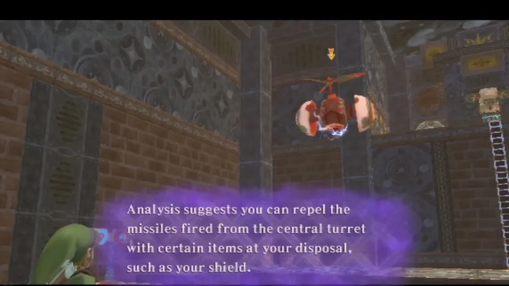 A red security drone hovers in a brick hall while a box says its turret missiles can be repelled with a shield. A red security drone hovers in a brick hall while a box says its turret missiles can be repelled with a shield.