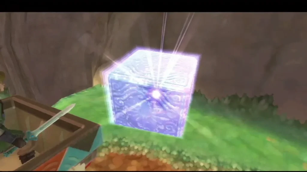 A Goddess Cube glows on a grassy ledge as Link passes in the mine cart