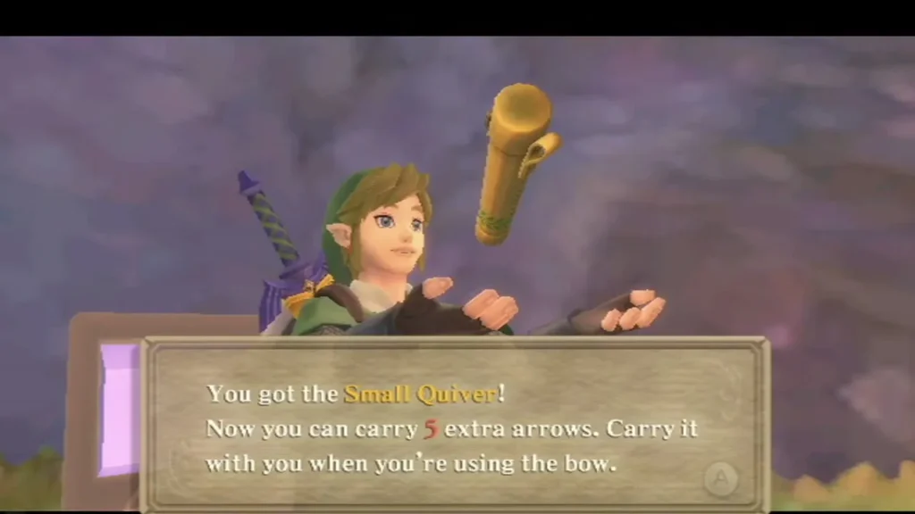 Link holds up the Small Quiver, the box reading it carries 5 extra arrows with the bow