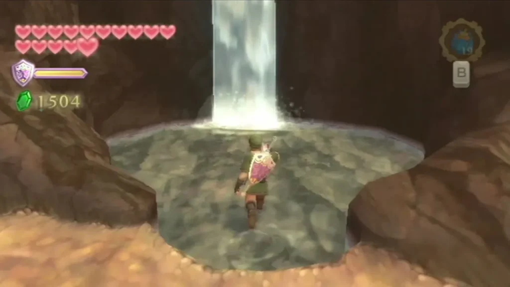 Link wades through the waterfall pool at Volcano Summit before gliding to the pillar behind it