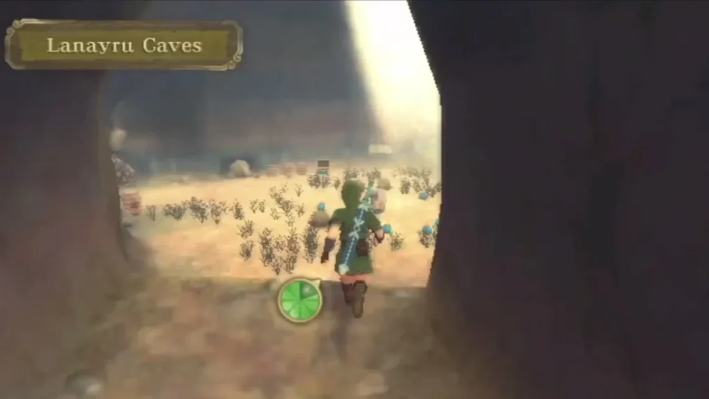 The Lanayru Caves title banner appears as Link stands in a cave mouth looking out over a field of shrubs. The Lanayru Caves title banner appears as Link stands in a cave mouth looking out over a field of shrubs.
