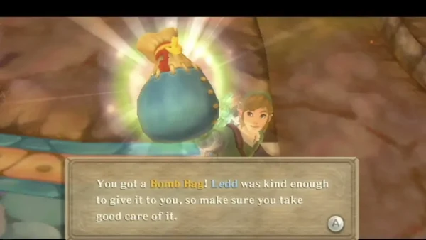 Link holds up a blue Bomb Bag, and the box says Ledd was kind enough to give it to him.