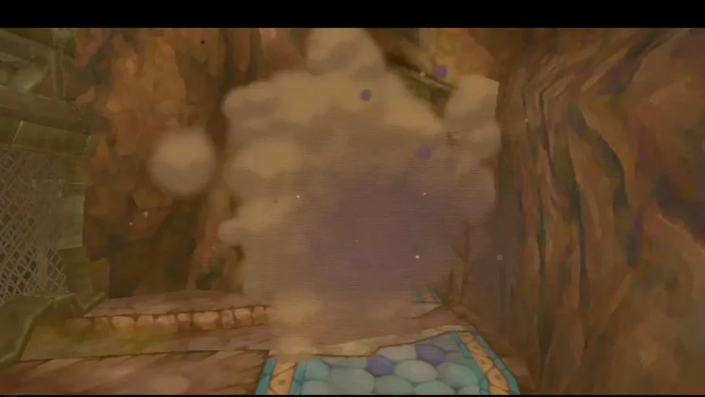 A bomb blast throws up dust in the narrow passage where the boulder pile stood a moment before.