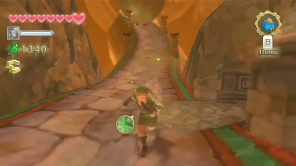Link sprints uphill along a stone slope while a boulder rolls down toward him.