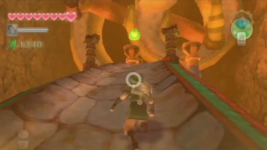 Link runs up a stone ramp lined with pillars inside the Earth Temple.