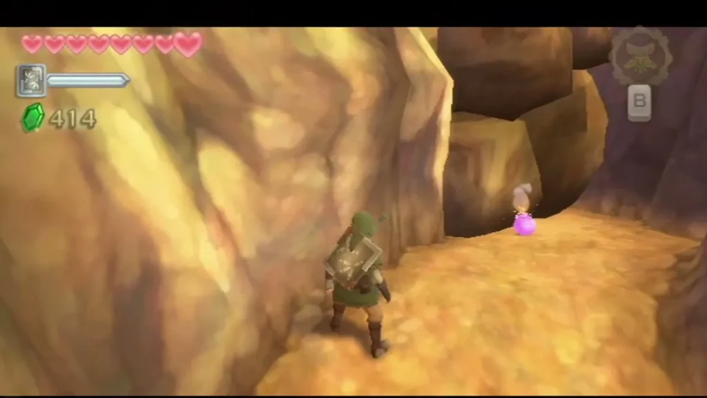 A lit bomb flower rests by the boulder pile as Link backs away along the cliff wall A lit bomb flower rests by the boulder pile as Link backs away along the cliff wall