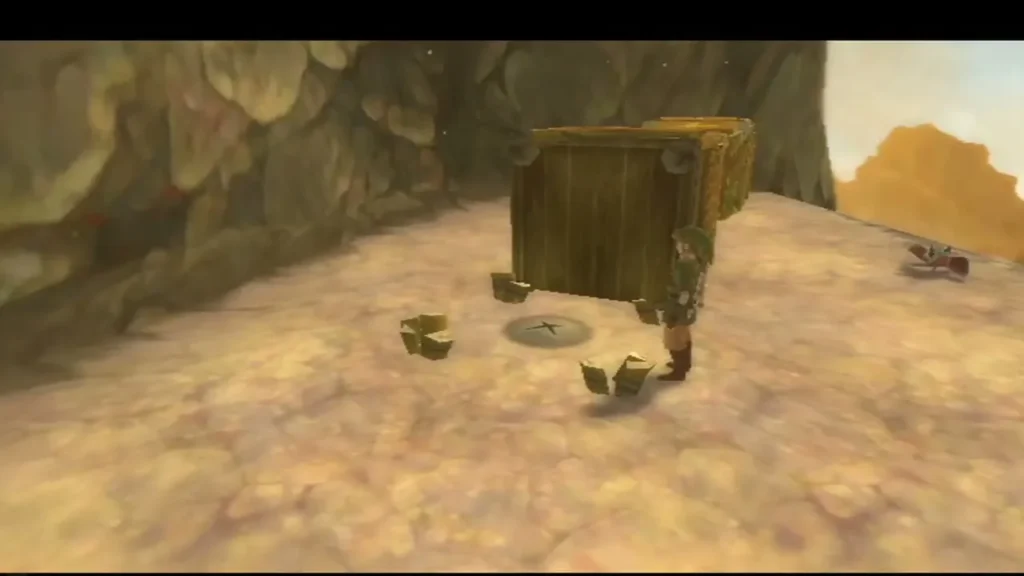 Link stands beside a wooden crate on a sandstone ledge, next to a dig spot marked with an X. Link stands beside a wooden crate on a sandstone ledge, next to a dig spot marked with an X.