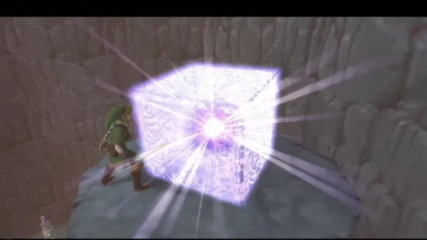 Link strikes a glowing Goddess Cube on a rock ledge Link strikes a glowing Goddess Cube on a rock ledge