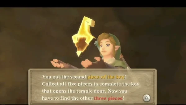 Link holds up the second piece of the key with its full message box Link holds up the second piece of the key with its full message box