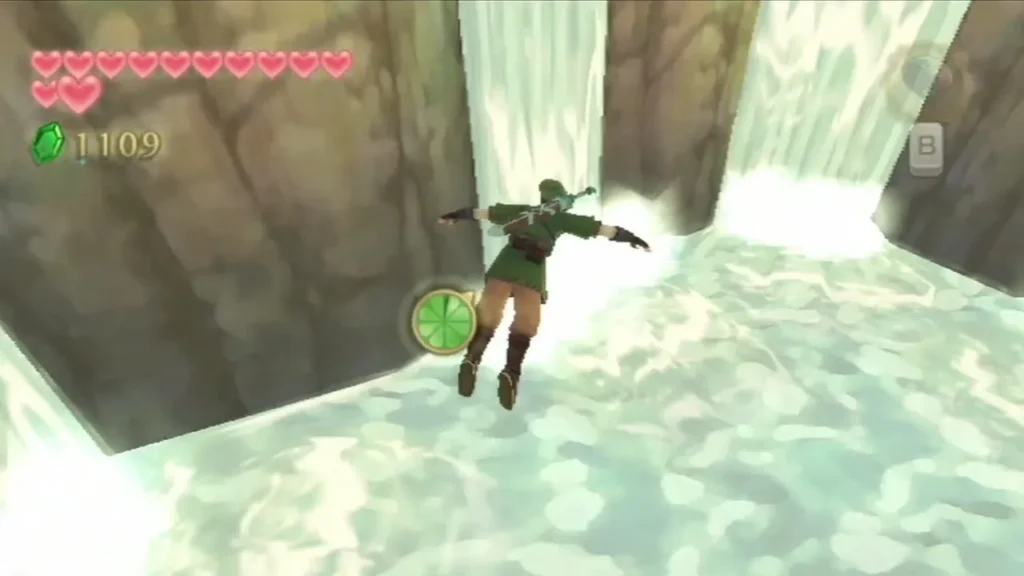 Link leaps off a waterfall ledge toward the pool at Lake Floria, arms out above the rushing water.