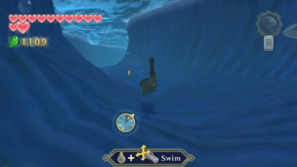 Link swims underwater at Lake Floria, with the Swim prompt shown at the bottom of the screen.
