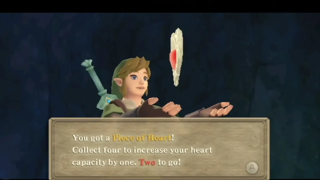 Link holds up a Piece of Heart in the cave, and the message box says two more will add a heart.