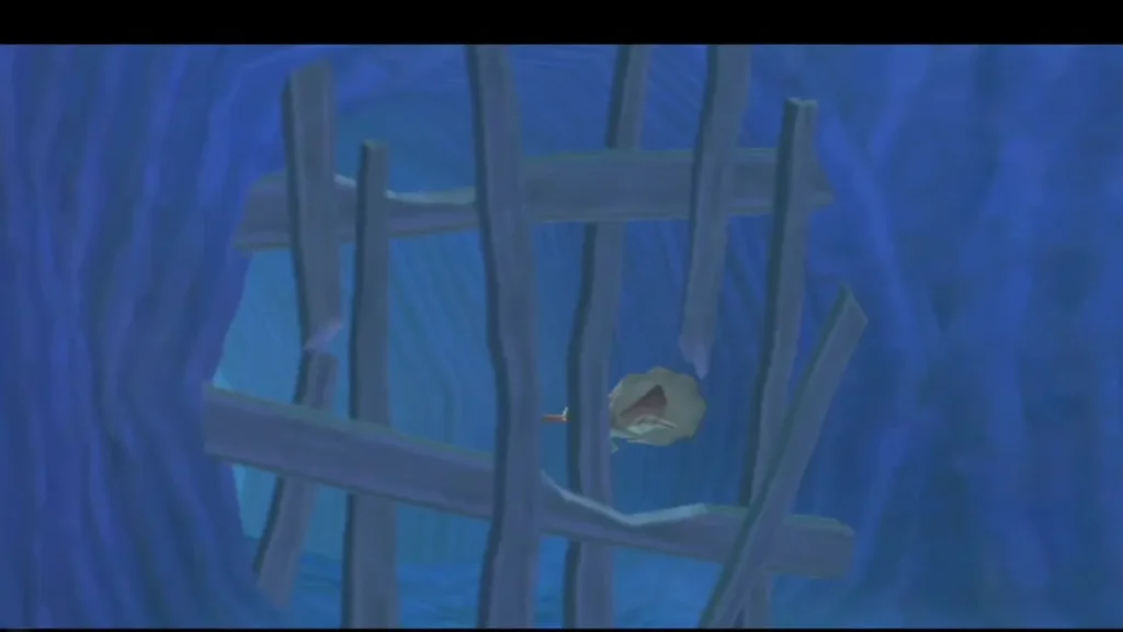 A spiky fish swims inside a cage of wooden barriers in an underwater ruin at Lake Floria.