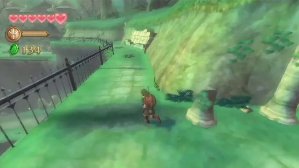 Link jogs along the fenced stone path through the Sealed Grounds, grassy slope and tree roots beside him Link jogs along the fenced stone path through the Sealed Grounds, grassy slope and tree roots beside him