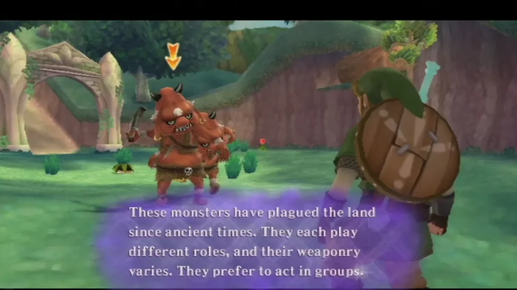 Two red Bokoblins stand on the grass while Fi explains that these monsters act in groups. Two red Bokoblins stand on the grass while Fi explains that these monsters act in groups.