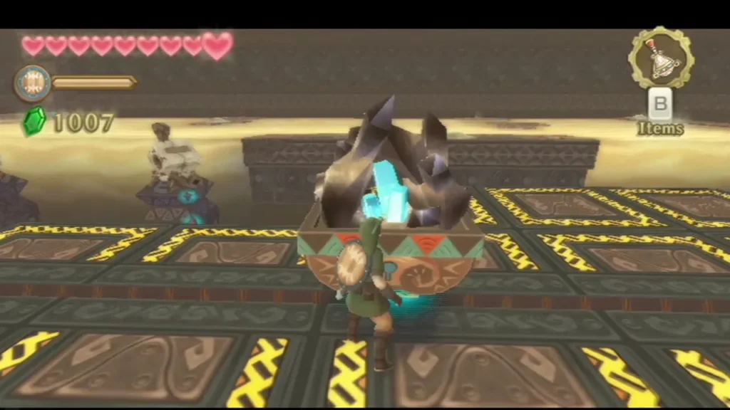 Link beside a cart with a blue Timeshift Stone on a patterned floor in the ruin. Link beside a cart with a blue Timeshift Stone on a patterned floor in the ruin.