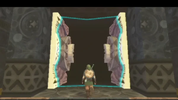 Tall golden doors in the ruin slide apart onto a dark passage as Link walks toward them. Tall golden doors in the ruin slide apart onto a dark passage as Link walks toward them.