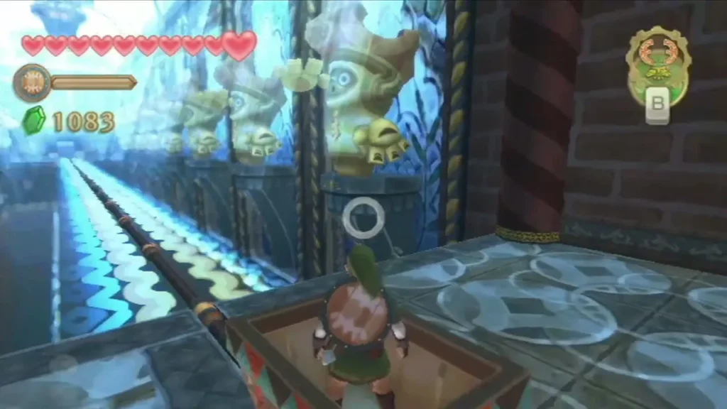 Link rides a mine cart along a rail through a blue-lit hall lined with carved statues. Link rides a mine cart along a rail through a blue-lit hall lined with carved statues.