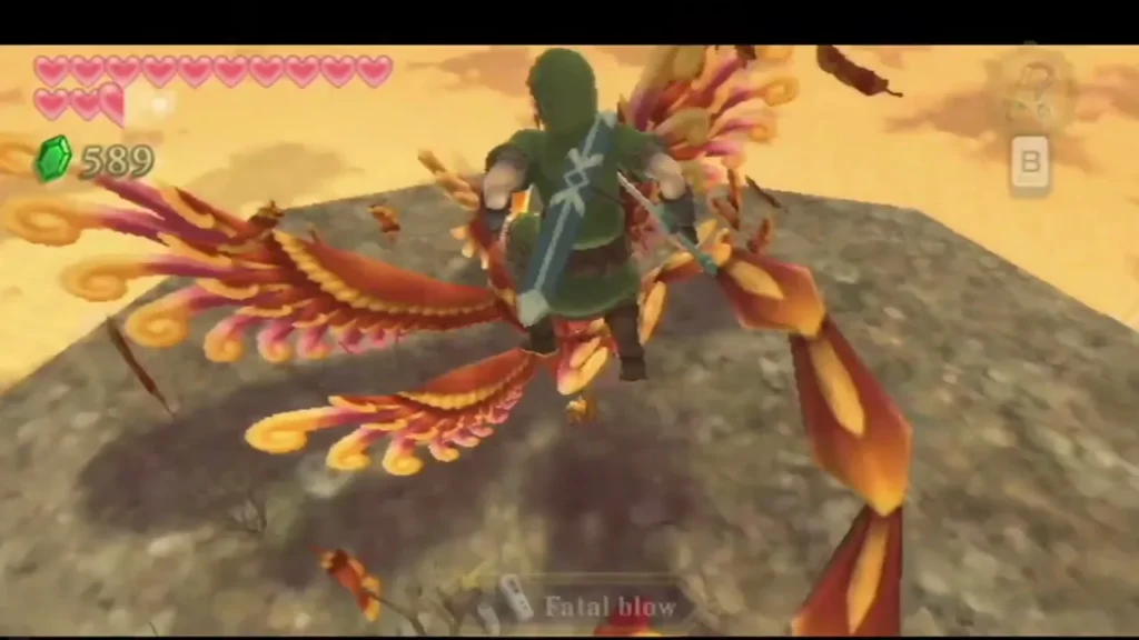 Link stands on a rock ledge with his sword drawn as a fiery phoenix-like bird swoops in, a Fatal blow prompt shown. Link stands on a rock ledge with his sword drawn as a fiery phoenix-like bird swoops in, a Fatal blow prompt shown.