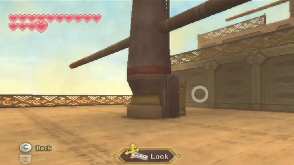 The Sandship deck beside a wooden mast, with the Look prompt at the bottom of the screen. The Sandship deck beside a wooden mast, with the Look prompt at the bottom of the screen.