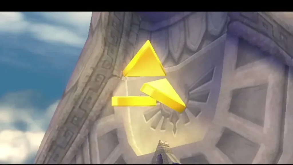 Golden Triforce pieces glow over the Triforce emblem carved into the Goddess statue.