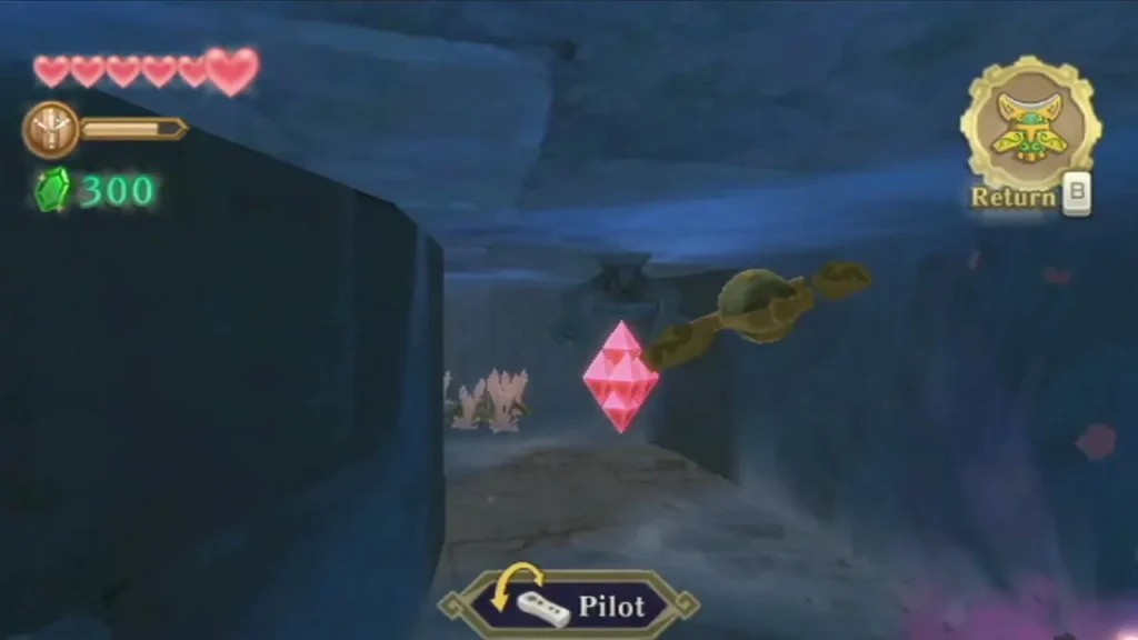 The Beetle flies toward a pink crystal at the end of a stone passage, with the Pilot prompt on screen. The Beetle flies toward a pink crystal at the end of a stone passage, with the Pilot prompt on screen.
