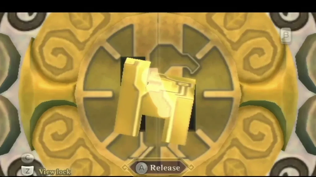Link turns the Golden Carving in the gold lock of the boss door, with the Release prompt on screen. Link turns the Golden Carving in the gold lock of the boss door, with the Release prompt on screen.