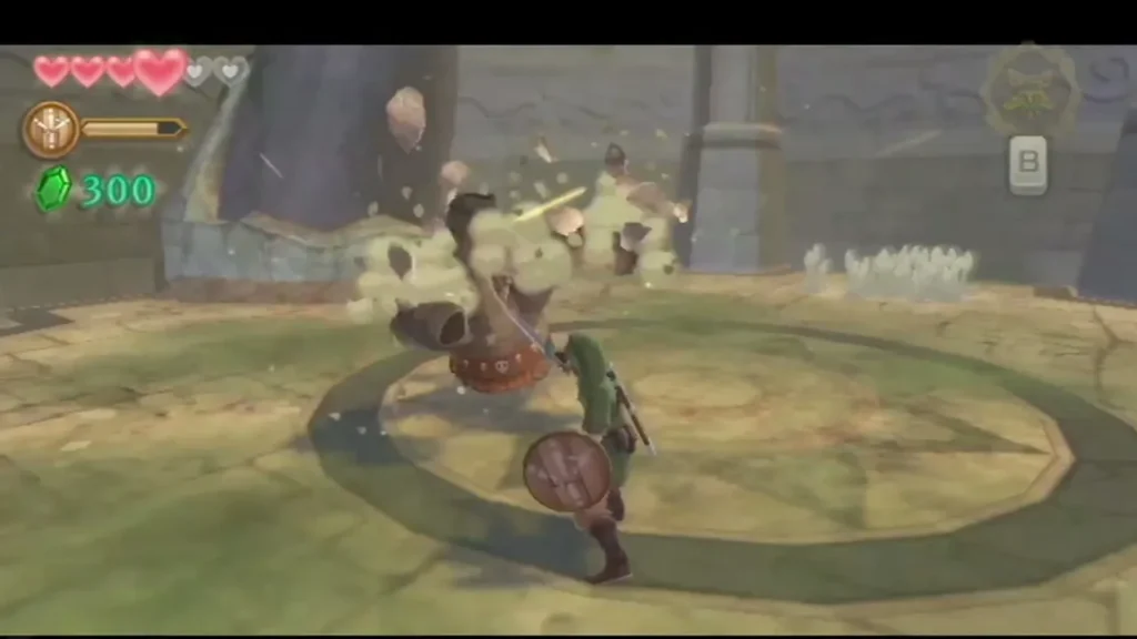 Link's sword cuts into the Staldra in a burst of dust as its heads fly off in the arena. Link's sword cuts into the Staldra in a burst of dust as its heads fly off in the arena.